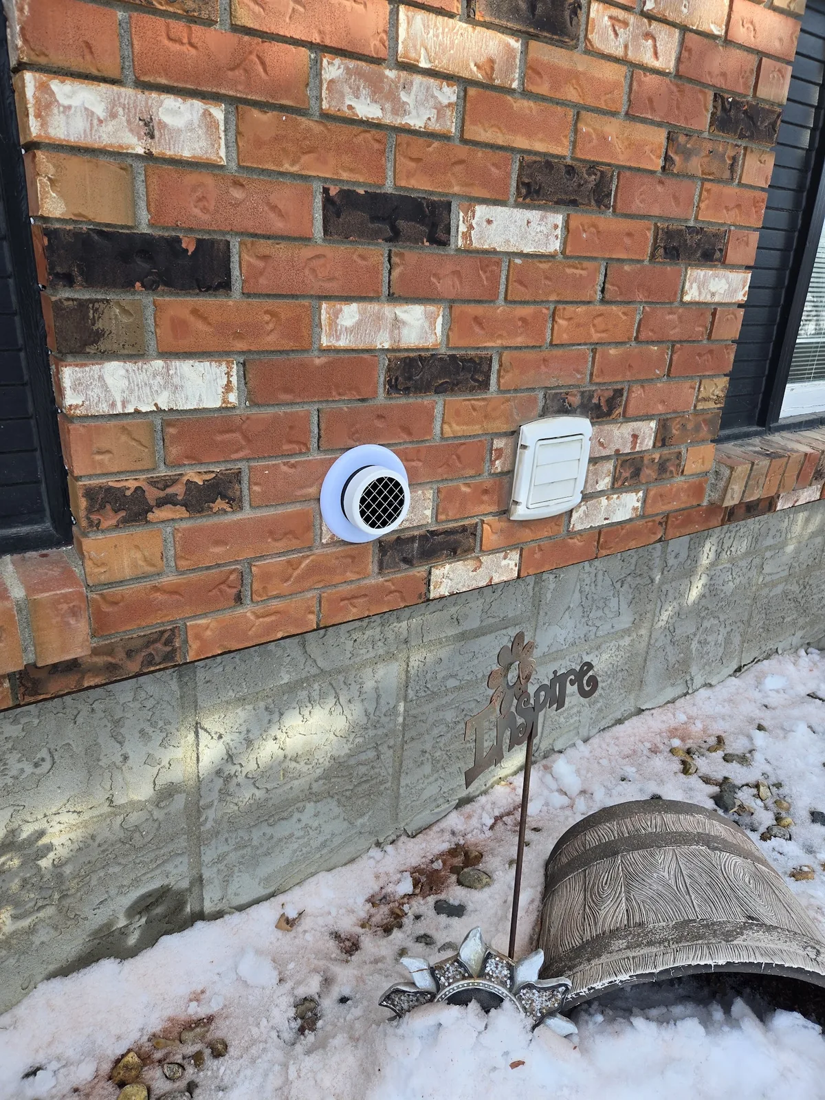 A radon mitigation system installed in a Pilot Butte home by Sask Air Solutions